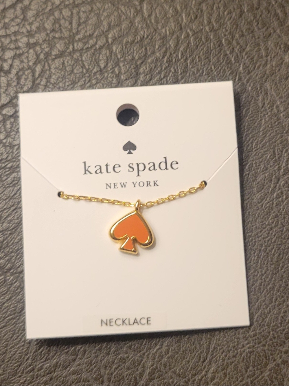 kate spade Gold Necklace with Orange Spade Pendant